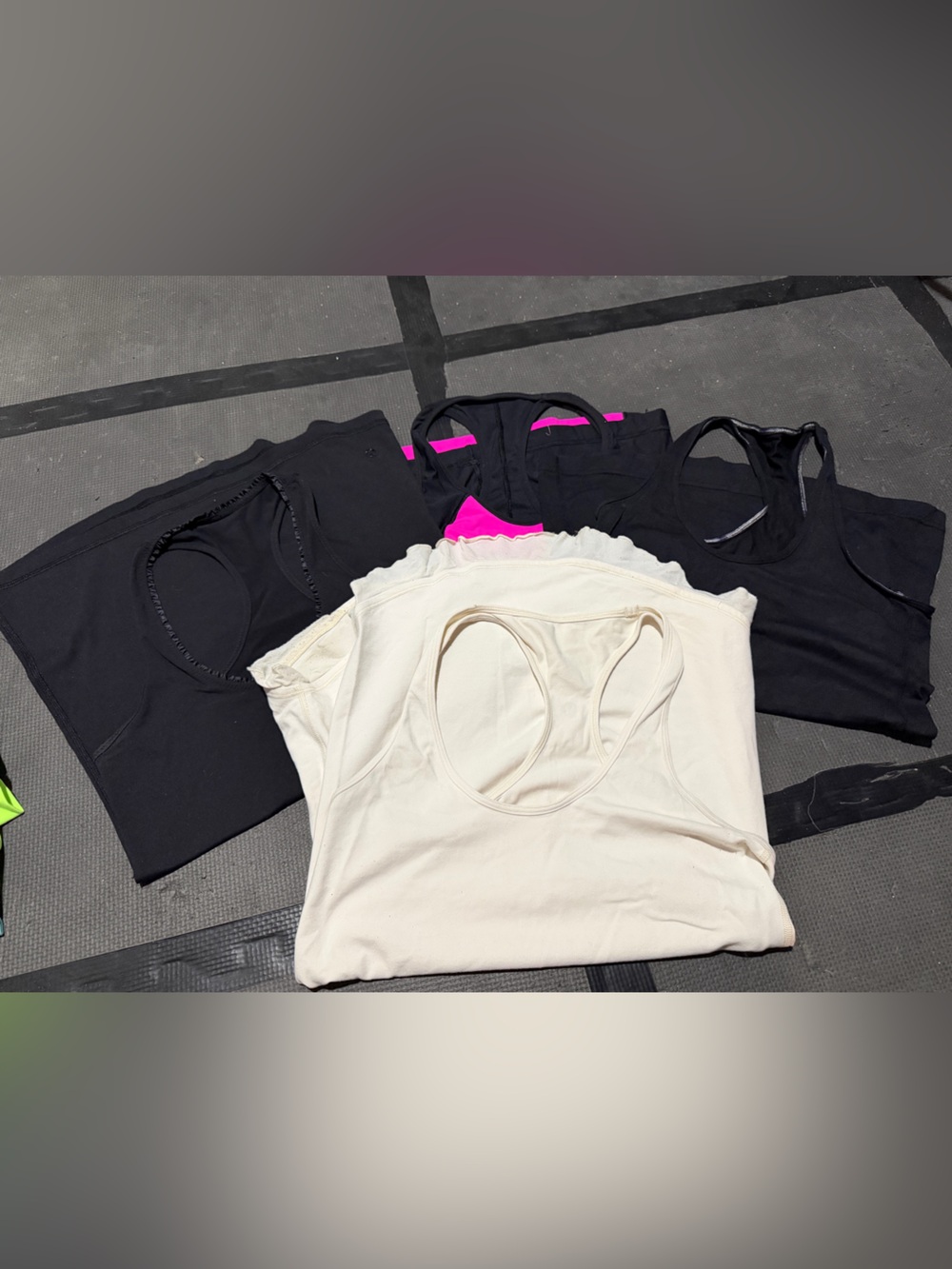 Bundle of 4 rare and vintage lululemon tanks